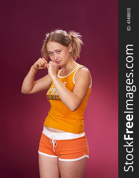 Sport girl on a red background