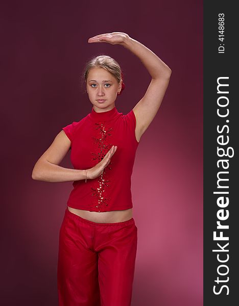 Sexy erotic dance on a red background