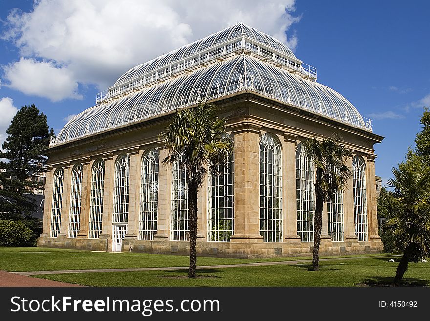 A victorian glasshouse in a Botanic Garden. A victorian glasshouse in a Botanic Garden