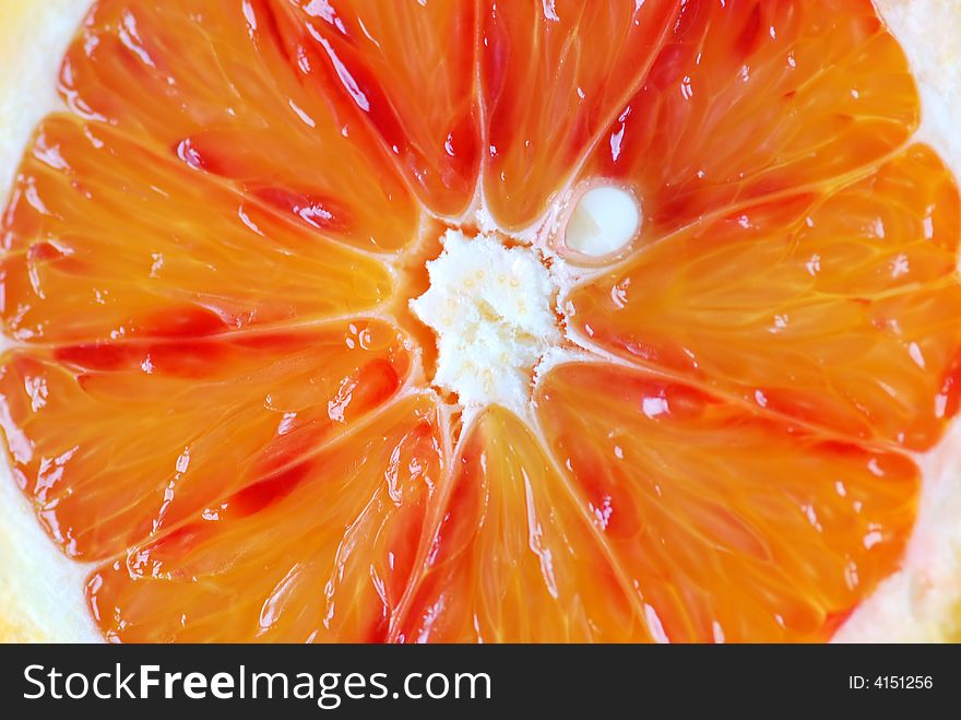 Close up image of  slice of red orange