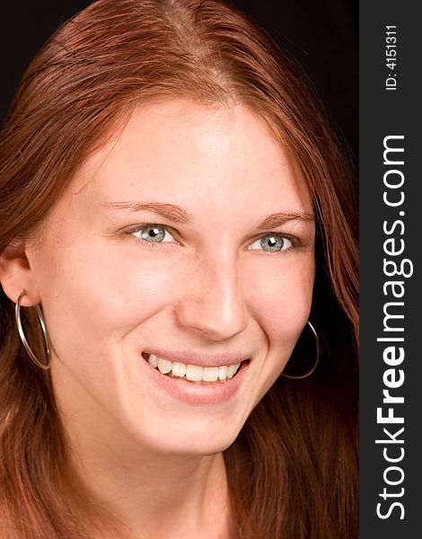 Closeup portrait of beautiful redhead with blue eyes. Closeup portrait of beautiful redhead with blue eyes