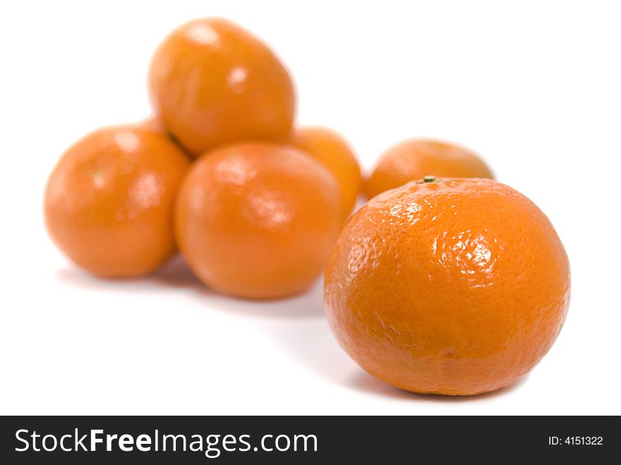 Some tangerines over white background