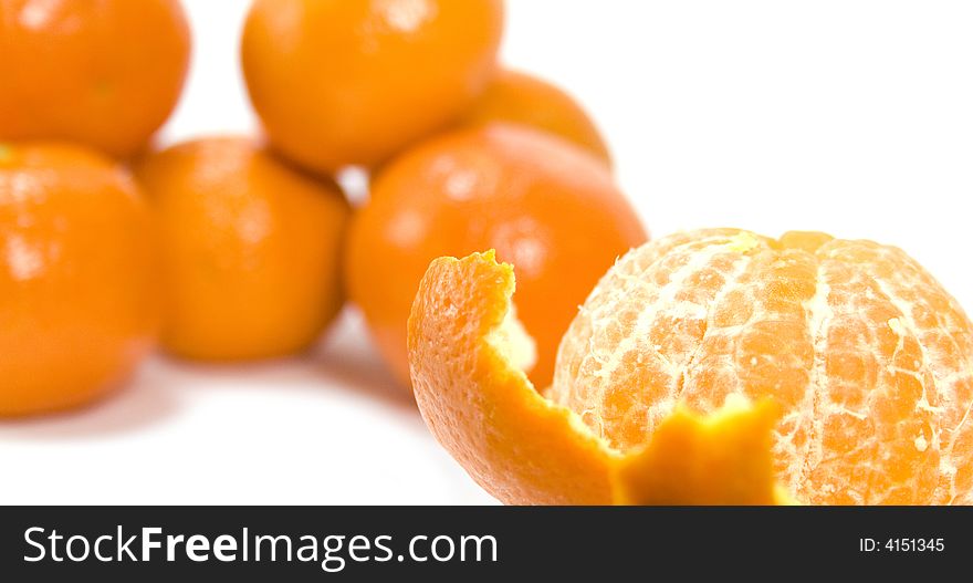 Some tangerines over white background