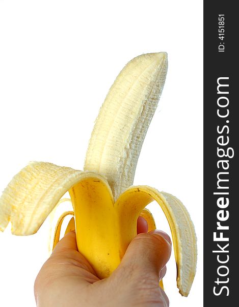 Image showing a hand holding a banana, isolated on white background. Image showing a hand holding a banana, isolated on white background.