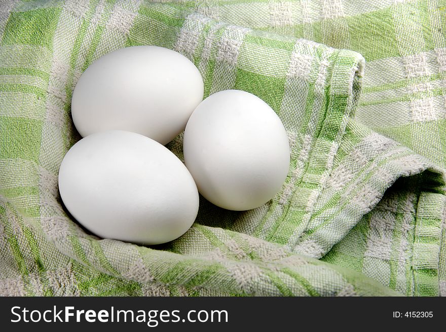 Three Eggs In A Dish Towel