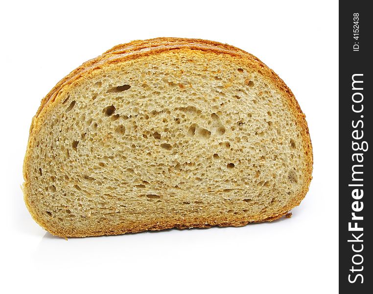 Cut of fresh baked bread isolated over white background