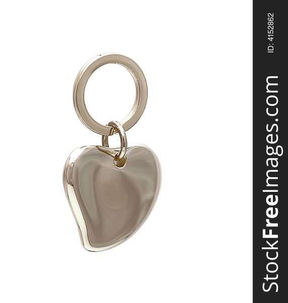 Heart- shaped metal locket isolated on white. Heart- shaped metal locket isolated on white