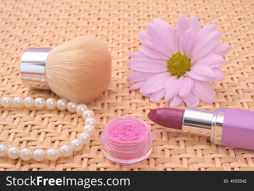 Lipstick and Eyeshadow With Flower and Pearls. Lipstick and Eyeshadow With Flower and Pearls