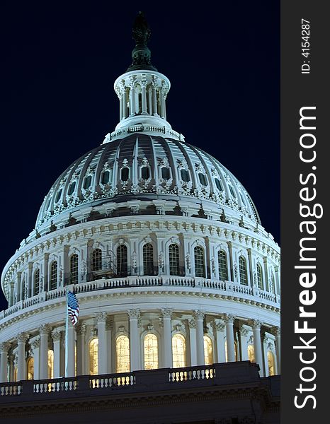 Photo of details of the dome of the US capitol at night. Photo of details of the dome of the US capitol at night