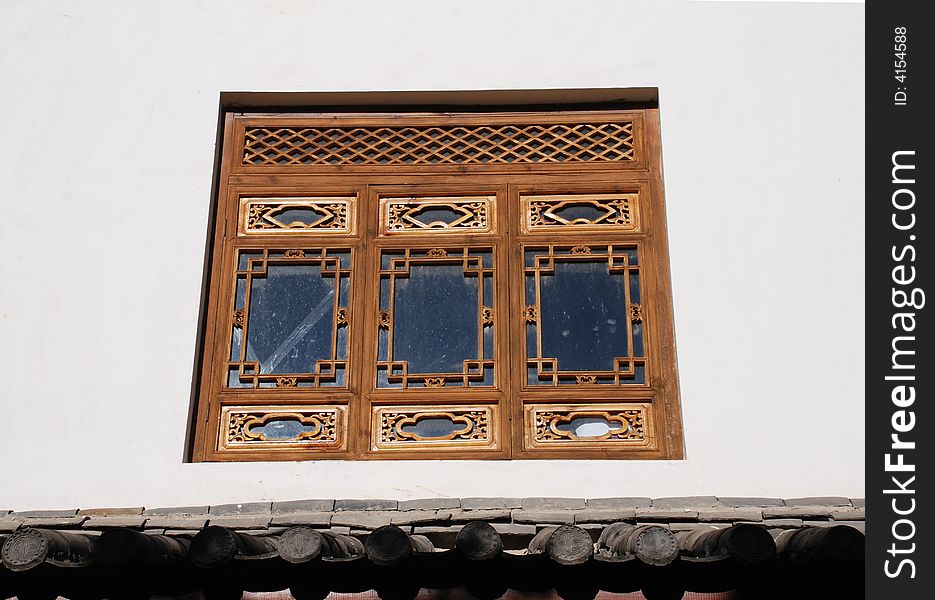 Traditional locl chased windows of Shuhe Town,Lijiang,Yunnan,China. Traditional locl chased windows of Shuhe Town,Lijiang,Yunnan,China
