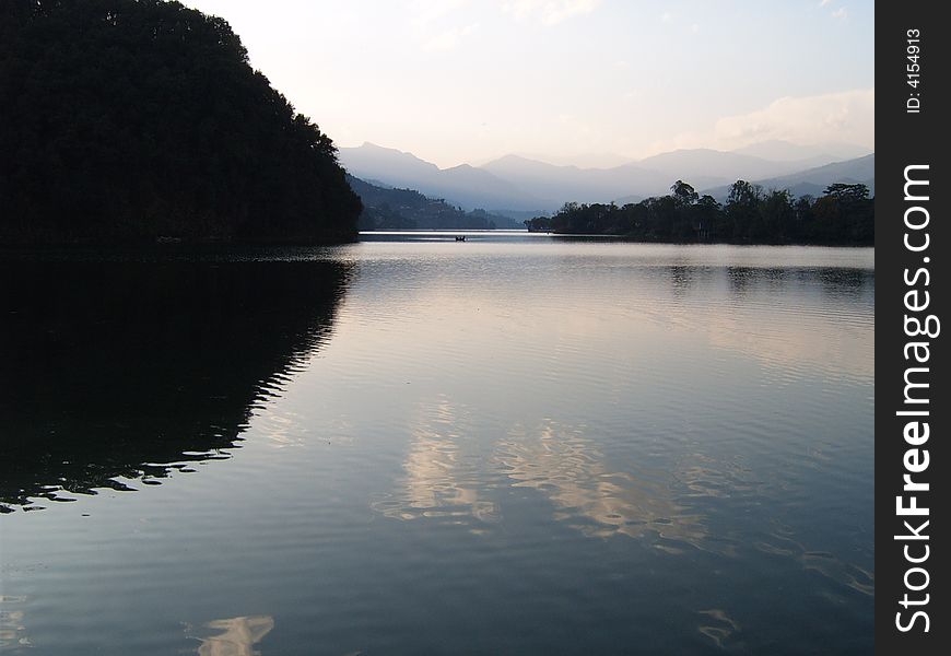 Phewa Lake in Pokhara with reflection, Peru