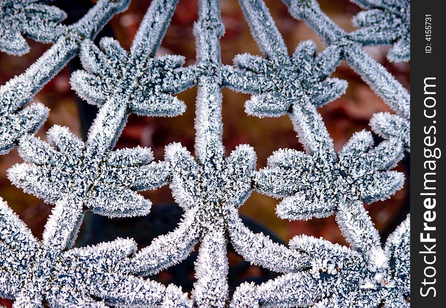 Ice crystals at the iron garden table. Ice crystals at the iron garden table