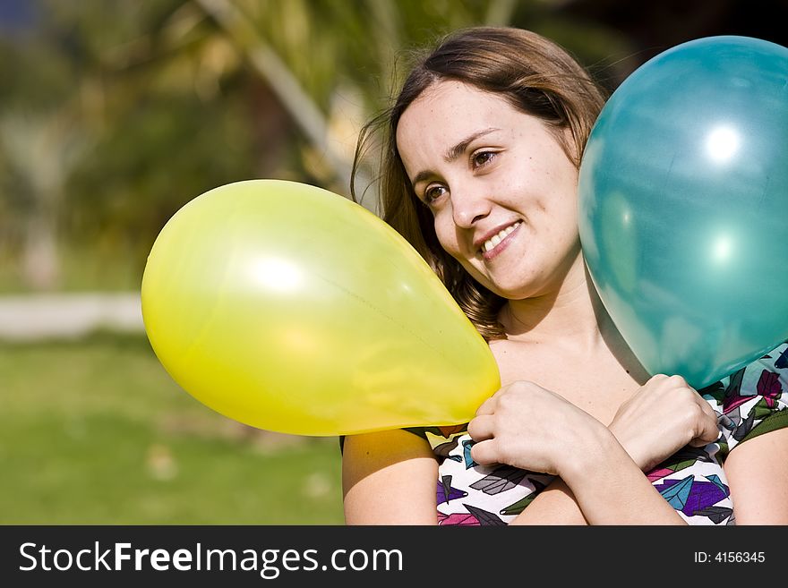 Beautiful woman with balloons in her hands. Beautiful woman with balloons in her hands