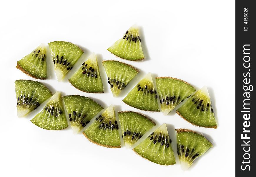 Triangular slices kiwi fruit as geometrical figure