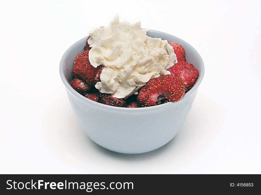 Delicious tasty strawberry under whipped cream. Delicious tasty strawberry under whipped cream