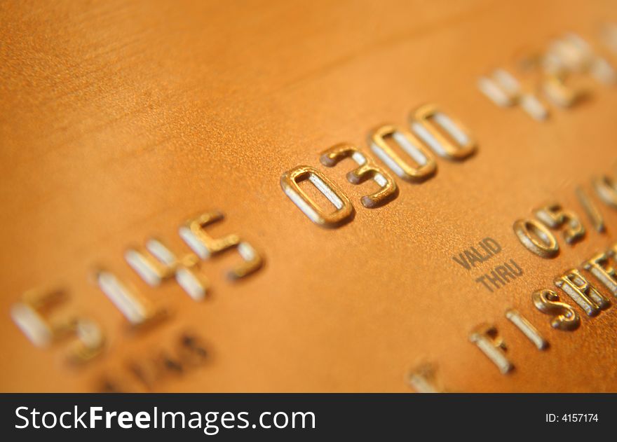 Close up of a credit card with shallow depth of field. Close up of a credit card with shallow depth of field.