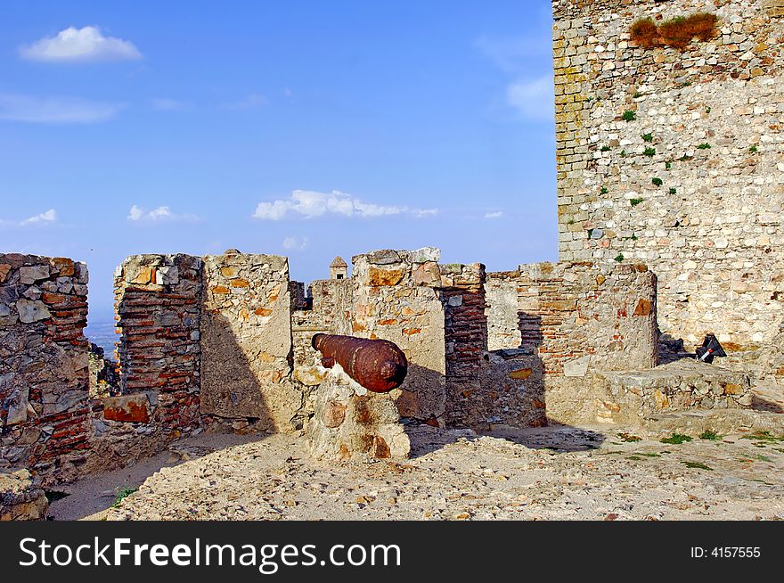 Portugal, area of Alentejo, Marvao: view of the castle; blue sky and a yellow stone fortress. Portugal, area of Alentejo, Marvao: view of the castle; blue sky and a yellow stone fortress