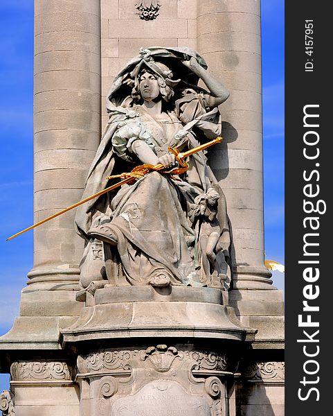 France, paris: Statues of Alexander III bridge; stone dressed statue