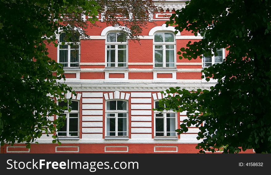 Windows in a wall of red color