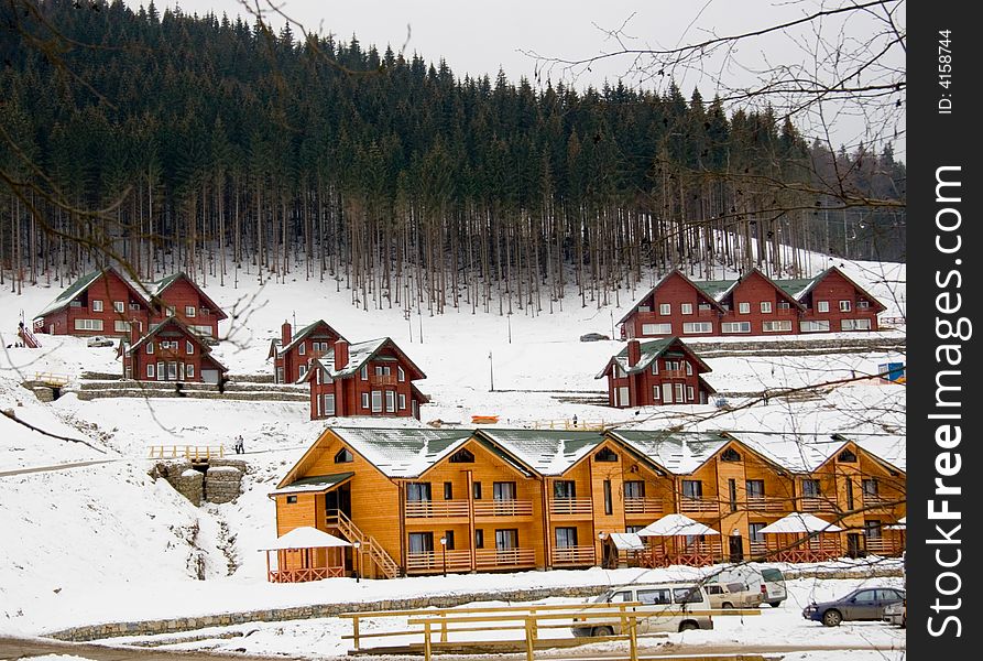 Wooden houses in the winter in Carpathians