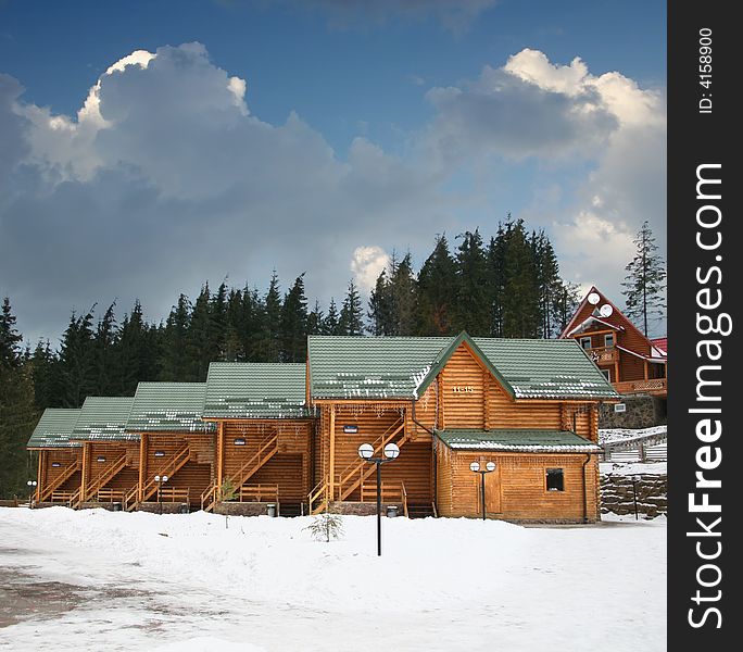 Wooden houses in the winter in Carpathians