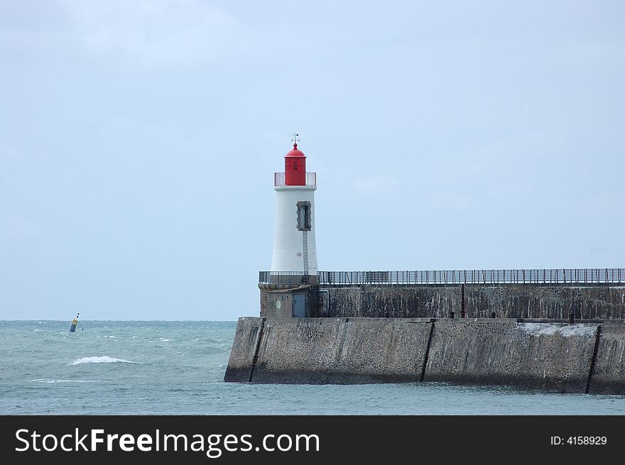 Breakwater with lighthouse on the top
