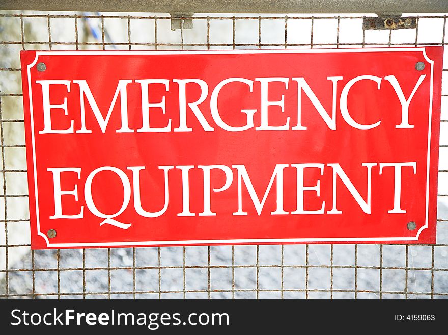 Sign with the inscription Emergency Equipment found on the beach. Sign with the inscription Emergency Equipment found on the beach.