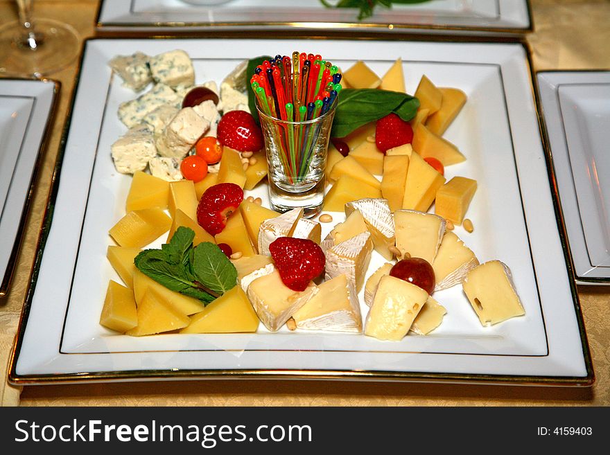 The image of beautifully made out dish with cheese assorts