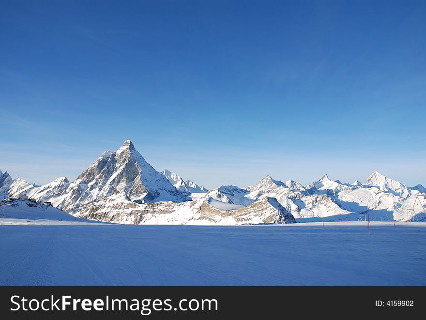 Alps panorama : blue snow and blue sky
