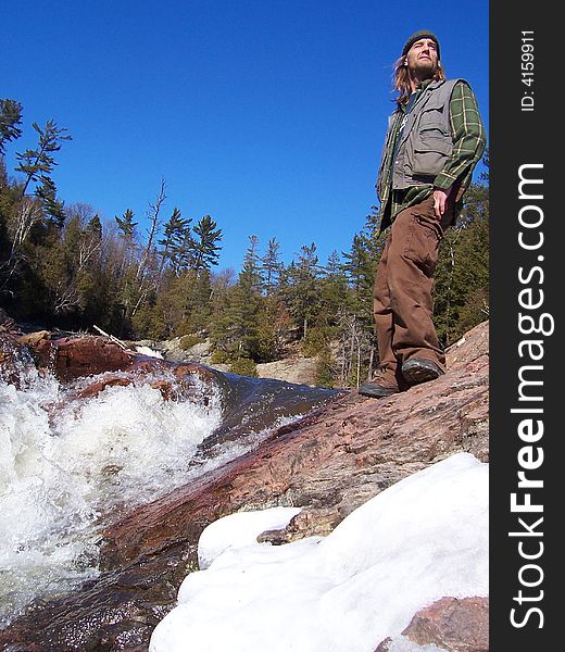 Melting snow creates a raging waterfall in Canada. Melting snow creates a raging waterfall in Canada.