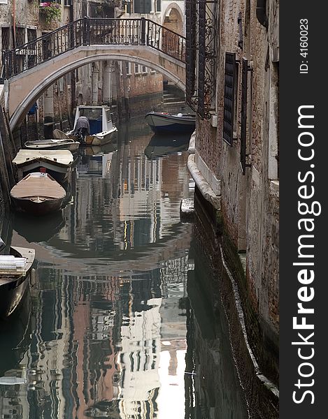Venetian canal with boats, Veince, Italy. Venetian canal with boats, Veince, Italy
