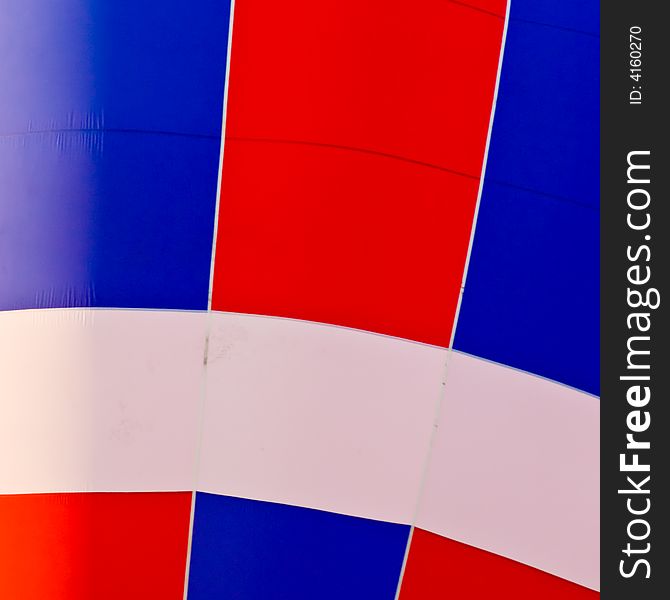 Close up of the canvas on a red white and blue hot air balloon. Close up of the canvas on a red white and blue hot air balloon