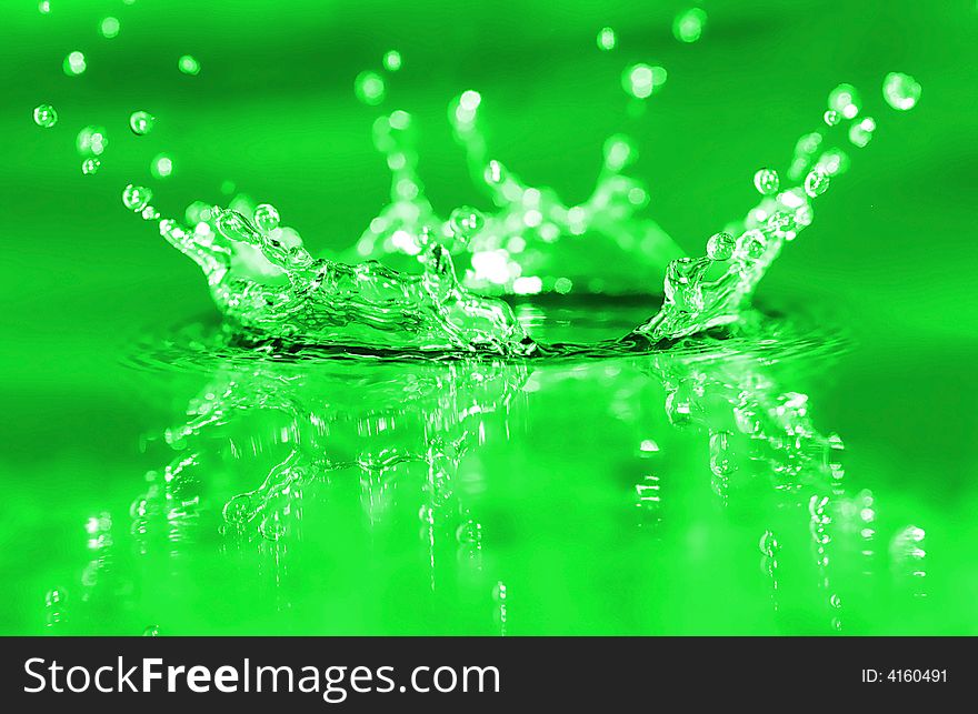 Fresh green water splash. Background.