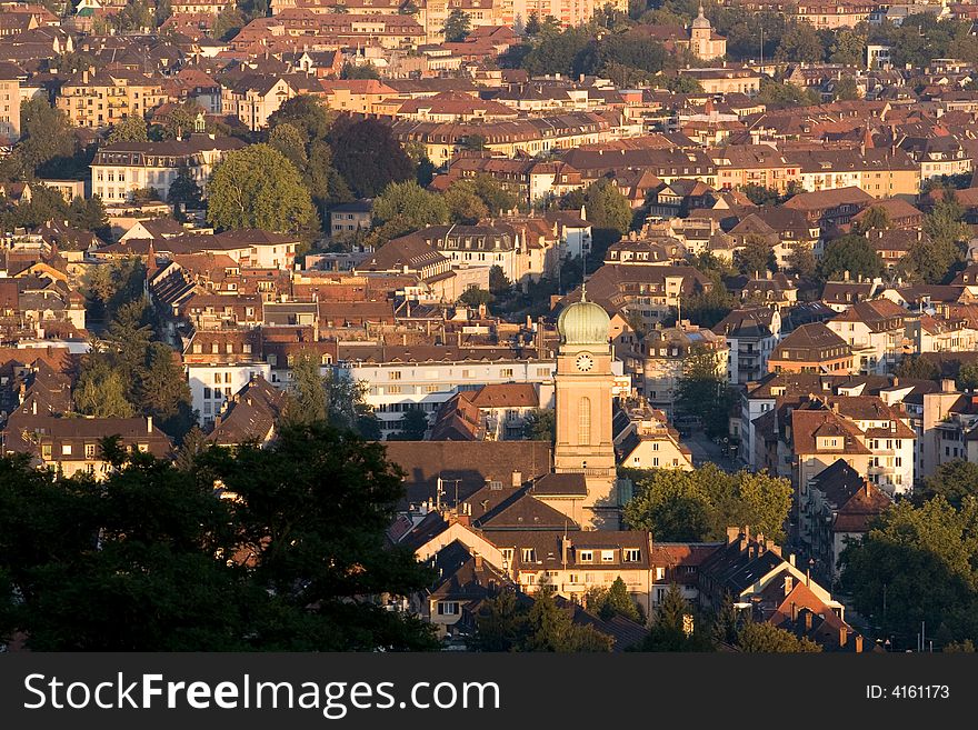 Zurich. Old houses with tiled roofs in the evening glow at sunset. Switzerland. Zurich. Old houses with tiled roofs in the evening glow at sunset. Switzerland