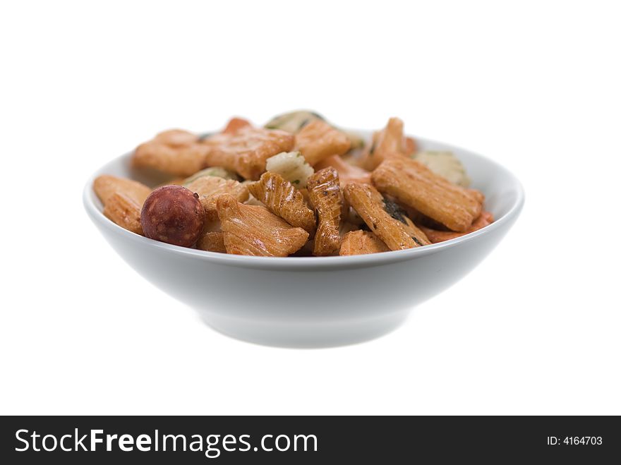 Isolated bowl of japanese rice crackers