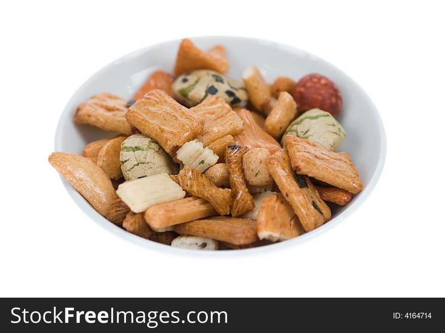 Isolated bowl of japanese rice crackers