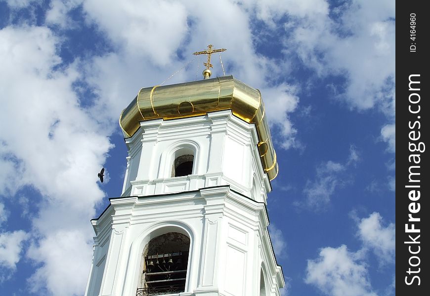 The russian church on the blue sky's background