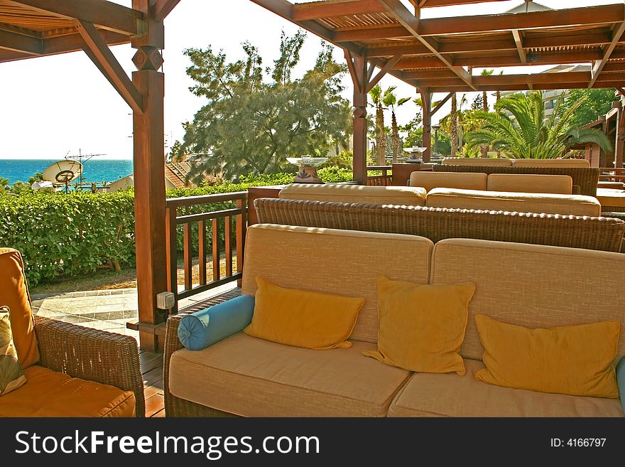 Outdoor furniture on the hotel veranda.