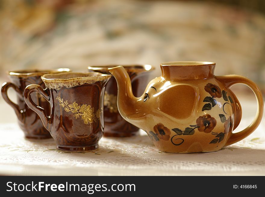 Cups and teapot for the domestic tea drinking. Cups and teapot for the domestic tea drinking