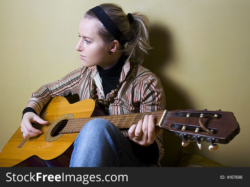 Young girl with her guitar. Young girl with her guitar