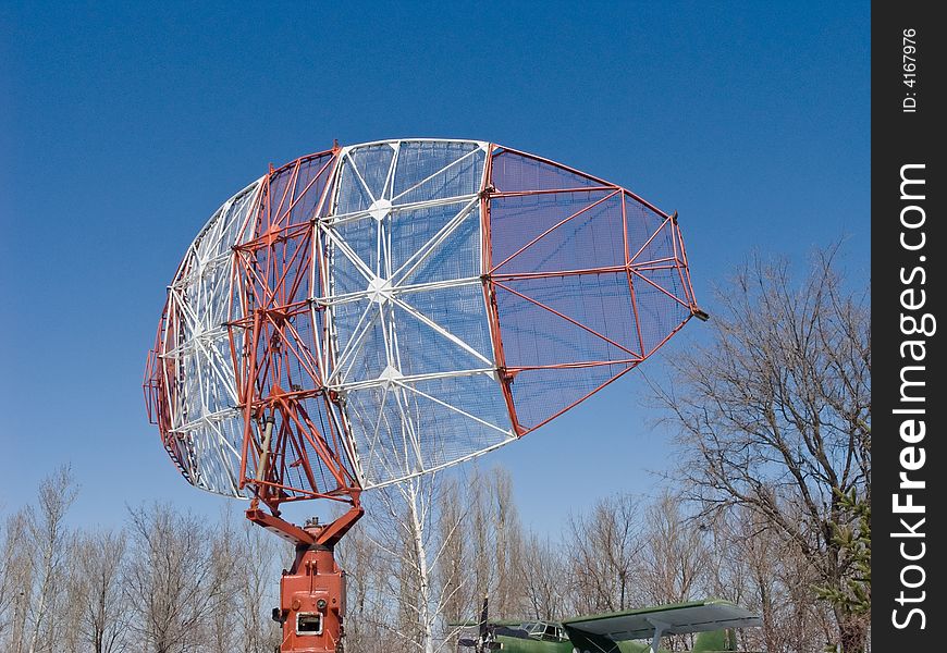 Radar at the small airport on a background of the sky