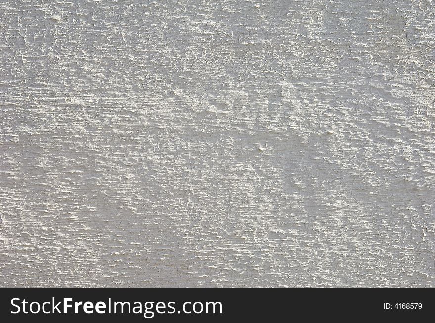 Detail of a rugged white wall suitable as background. Detail of a rugged white wall suitable as background