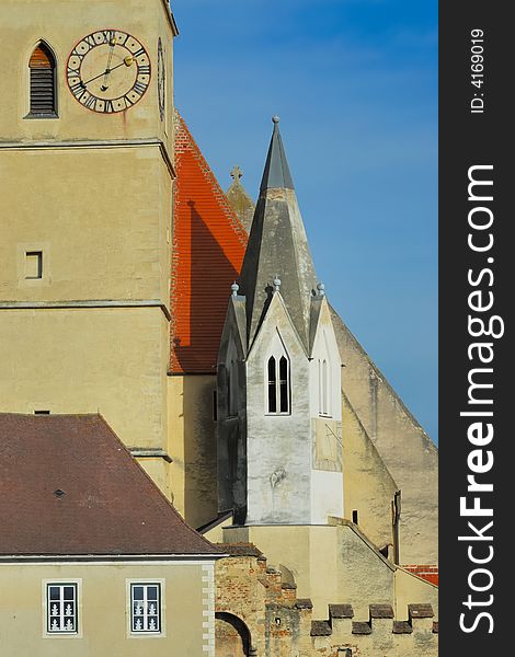 Historic church of Weissenkirchen with blue sky and clouds. Historic church of Weissenkirchen with blue sky and clouds