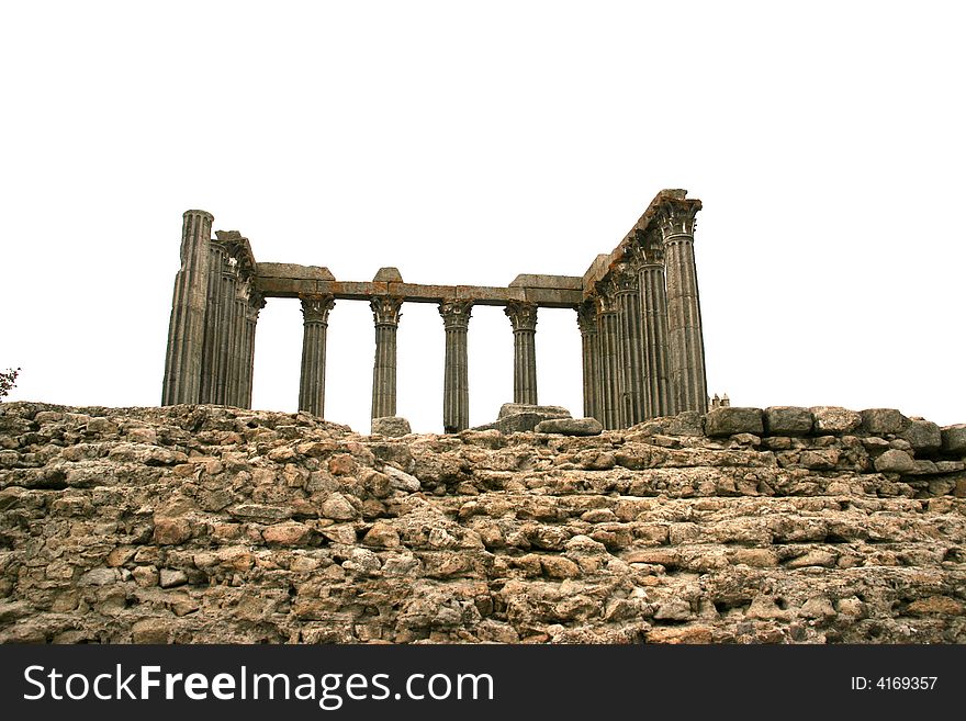 Ruins of roman temple in Evora, Portugal, isolated in white