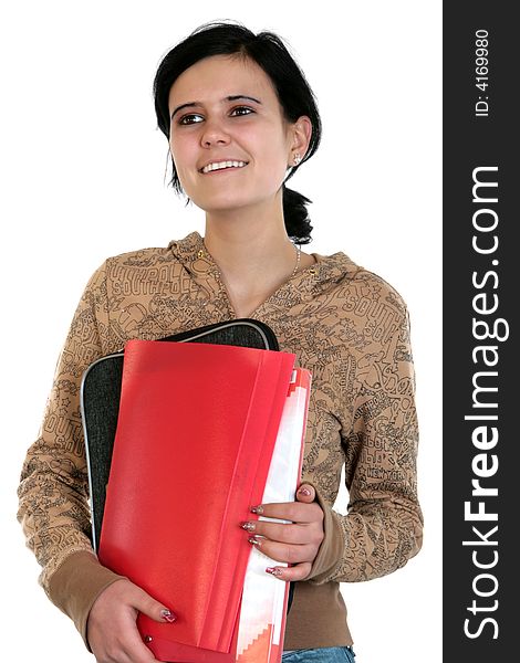 A smiling schoolgirl with black hair and with files. A smiling schoolgirl with black hair and with files