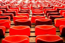 Curves Of Red Chairs Royalty Free Stock Photo