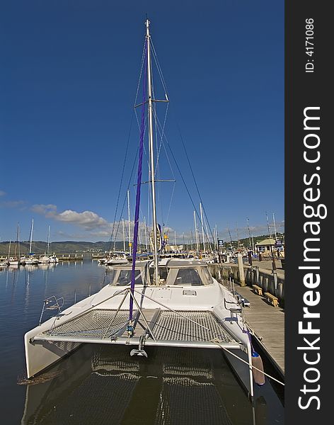 A twin Hull Yacht moored at the Knysna Yacht Club