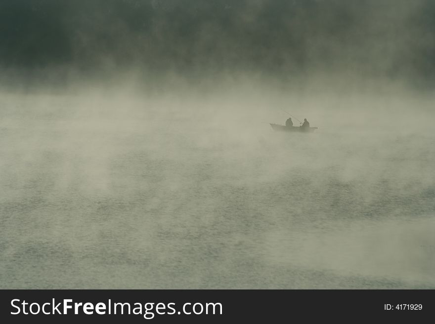 Two fishermen early autumn morning, Russia. Two fishermen early autumn morning, Russia