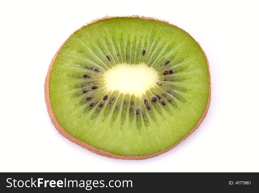 The piece of kiwi isolated on white background. Close-up.