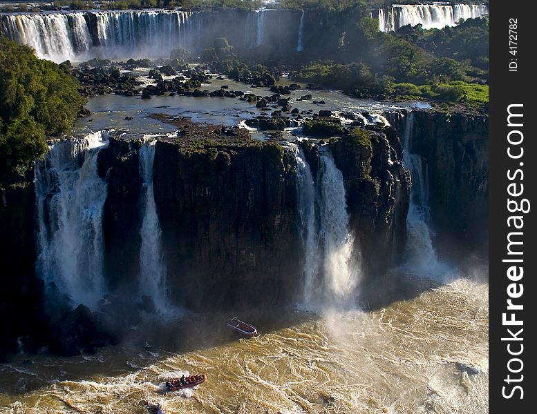 The IguaÃ§Ãº Falls are located in the IguaÃ§Ãº National Park, at the border of Brazil and Argentina. The IguaÃ§Ãº Falls are located in the IguaÃ§Ãº National Park, at the border of Brazil and Argentina.